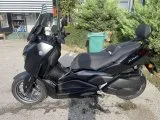 Yamaha Xmax tech 250 TKS değerlendirilir.